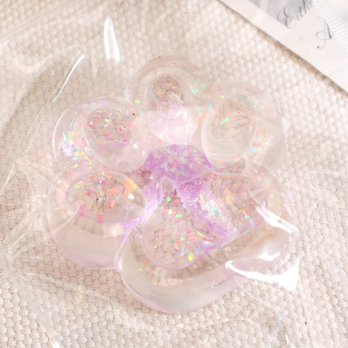Jucarie Antistres Squishy, Flippy, cu Revenire Lenta, Squeeze Pinch Family, Model Cat Paw, 6.5 x 7 cm, din Tpr, 4-6 Ani, Model 2 Flori, Transparent