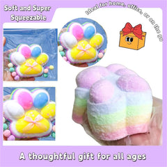 Jucarie Antistres Squishy, Flippy, cu Revenire Lenta, Model Labuta de Pisica Pufoasa, 12.5x10.5 cm, 220g, Squeeze Pinch Family, Ambalaj Transparent, Roz Curcubeu