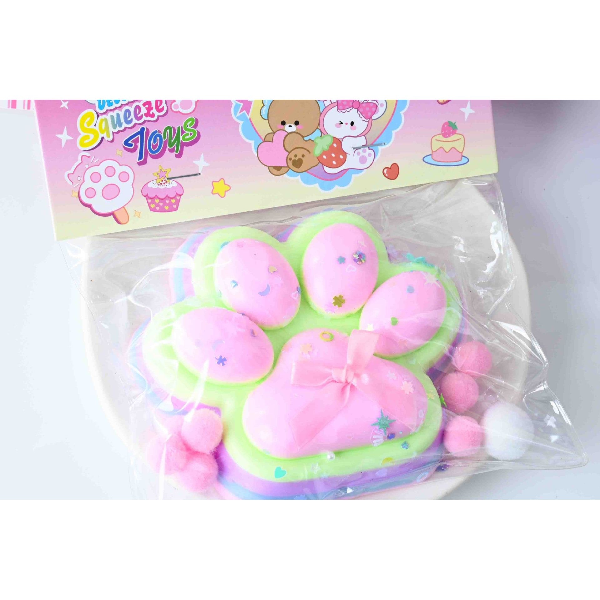 Jucarie Antistres Squishy, Flippy, cu Revenire Lenta, Model Labuta de Pisica YY1005, 220g, 12.5 x 10.5 cm, Squeeze Pinch Family, Ambalaj Transparent, Roz-Curcubeu