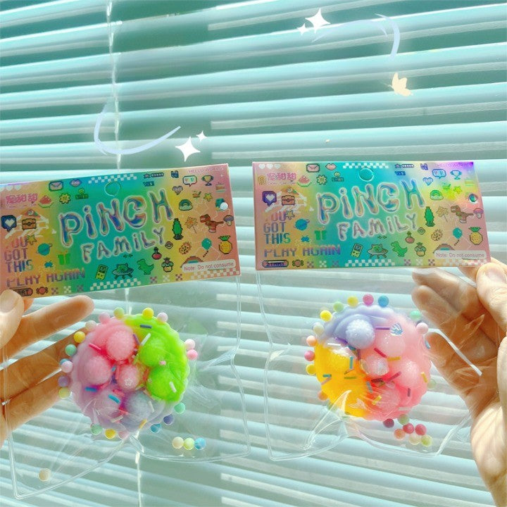 Jucarie Antistres Squishy, Flippy, cu Revenire Lenta, Squeeze Pinch Family, Model Prajiturica, 6x6 cm, 60g, Ambalaj Transparent, Multicolor