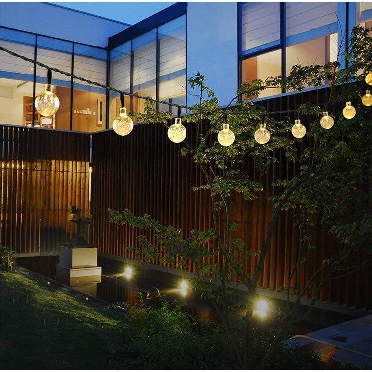 Instalatie Craciun, Tip Globuri de cristal, 50 Led-uri, 9.5 metri, Alb cald, Energie solara, Senzor de lumina, Flippy