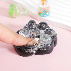 Jucarie Antistres Squishy, Flippy, cu Revenire Lenta, Model Cat Paw, Squeeze Pinch Family, 6.5 x 6 cm, din Tpr, 4-6 Ani, Model 2 Figurine, Negru cu Insertii