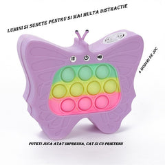 Jucarie Interactiva Tip Consola pentru Copii, Flippy, Diferite Moduri de Joc, 120 Nivele, Material ABS/silicon, Sunete si Lumini, 12 x 5.5 x 13.5 cm, Model Fluture, Mov