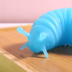 Jucarie Senzoriala Antistres, Flippy, Fidget Toys, Omida Tip Breloc, 11 cm, +3 Ani, Albastru Transparent
