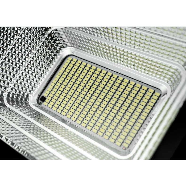 Proiector LED/Lampa solara de exterior Flippy, 20 cm x 25cm, Rezistent la Apa IP67, cu Panou Solar, 220 LED SMD, 65W, Senzor de lumina, Timer, cu Telecomanda, 2 moduri de iluminat, kit montaj inclus, Lumina Rece